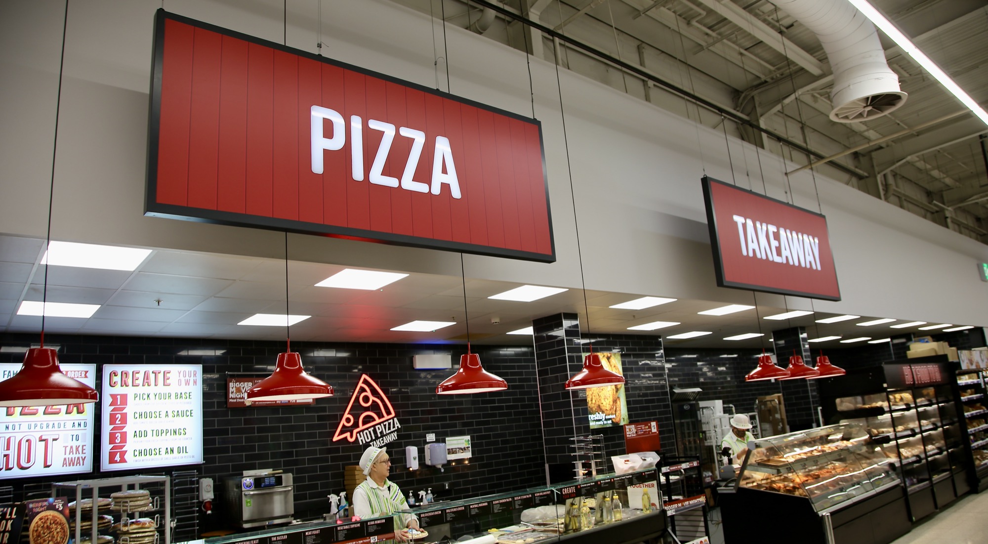 Pizza and takeaway signage in Asda