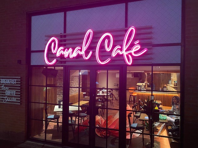 Canal Café neon signage - night