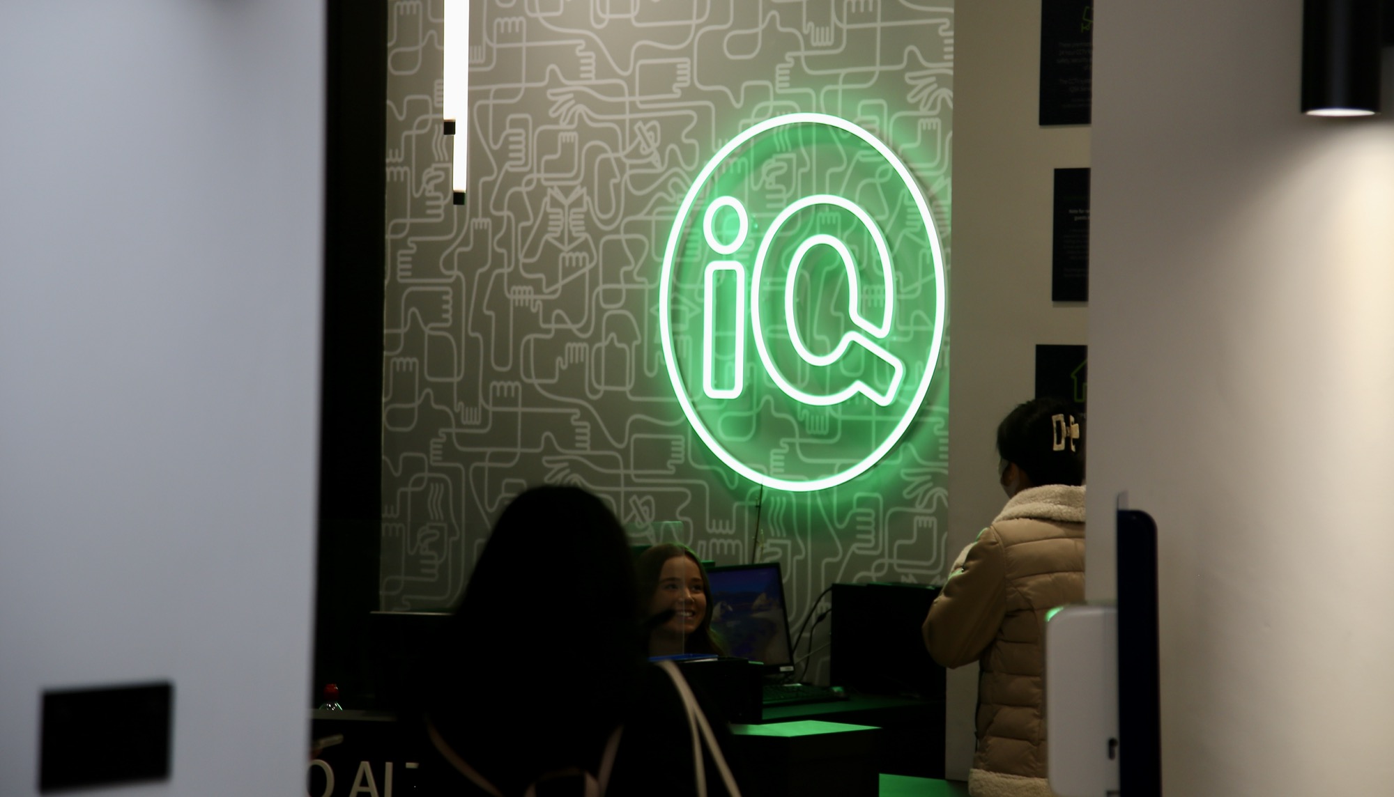 iQ student accomodation indoor neon signage