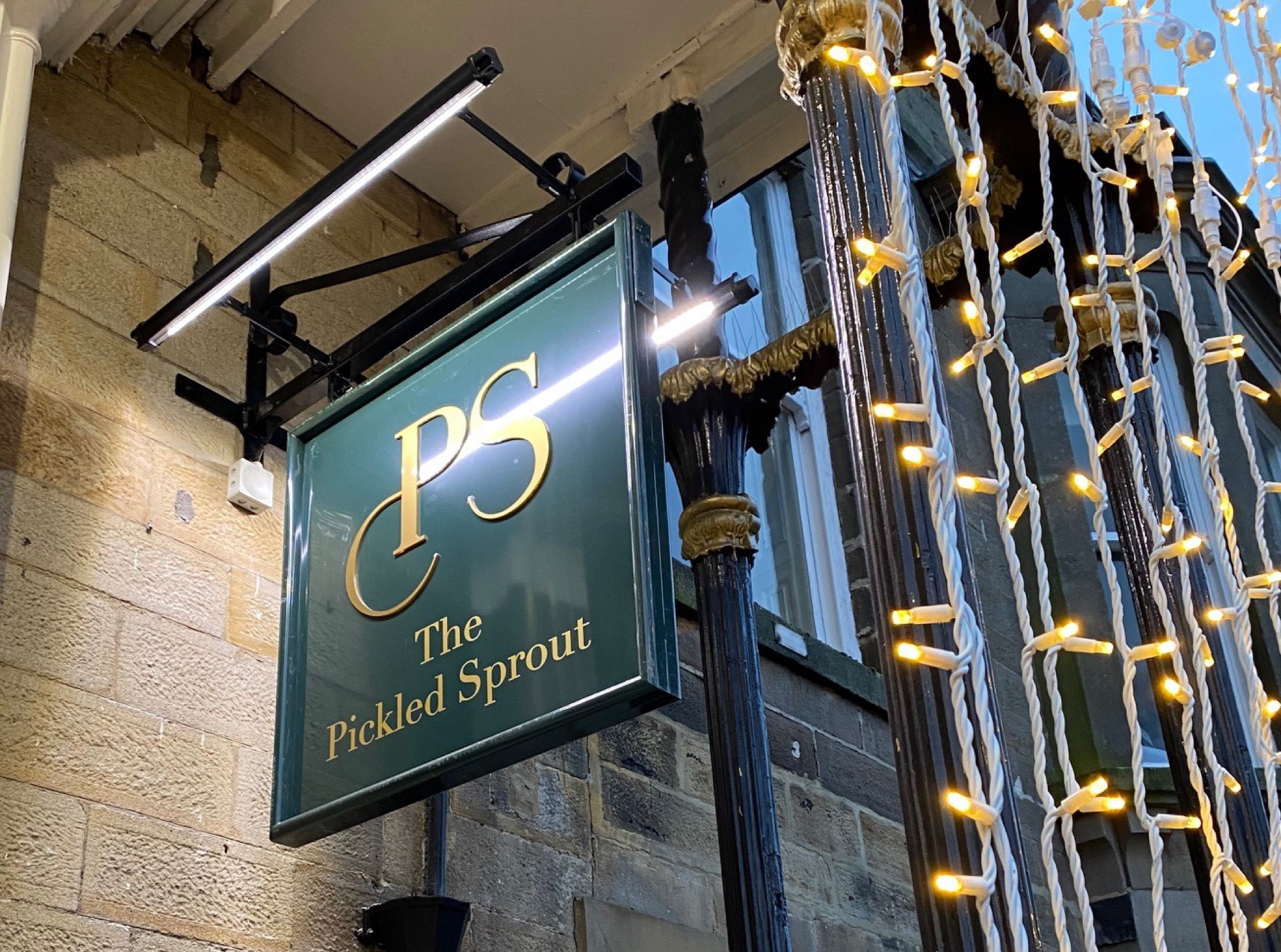 The Pickled Sprout hanging signage
