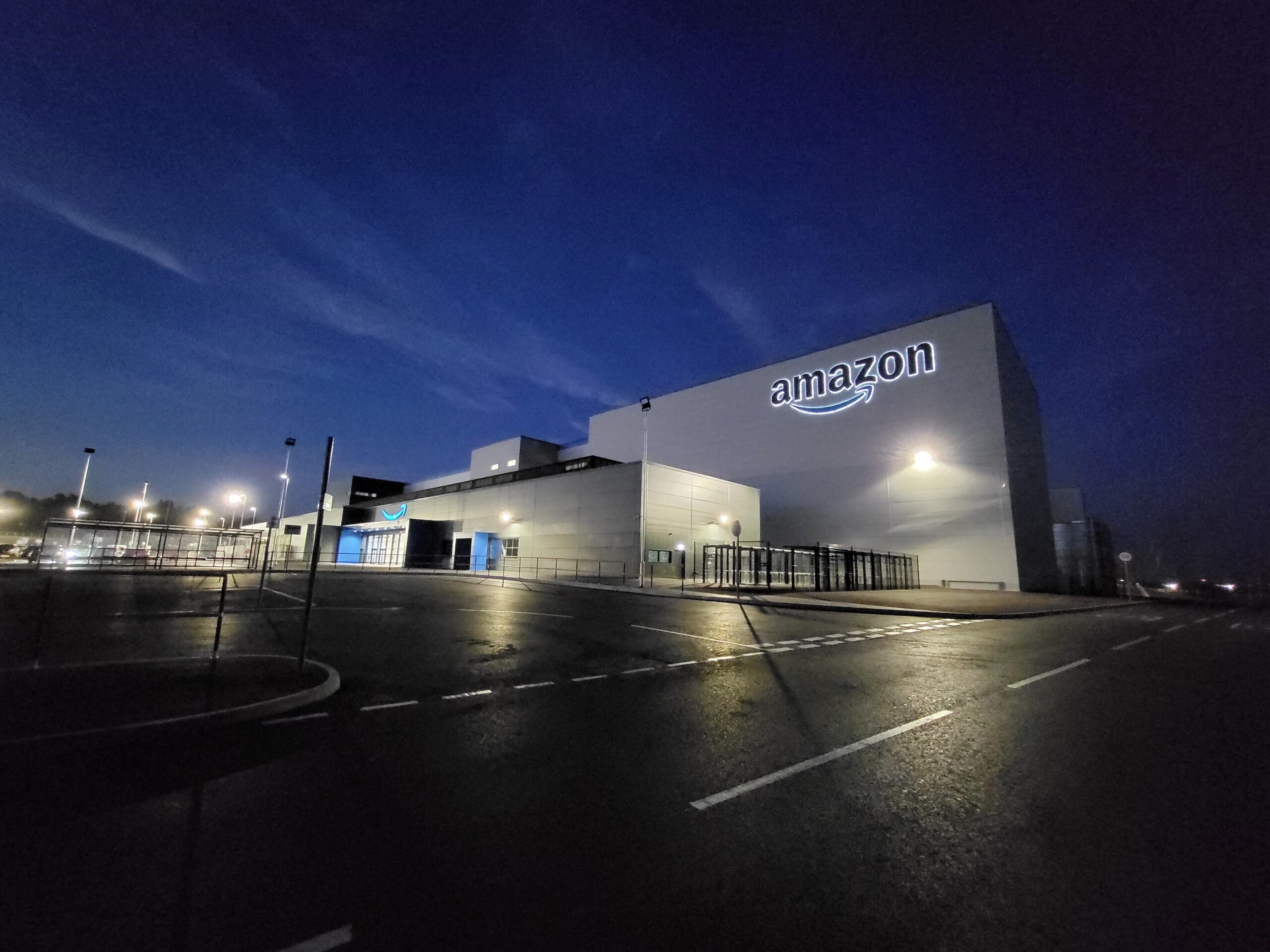 Amazon signs and building at night