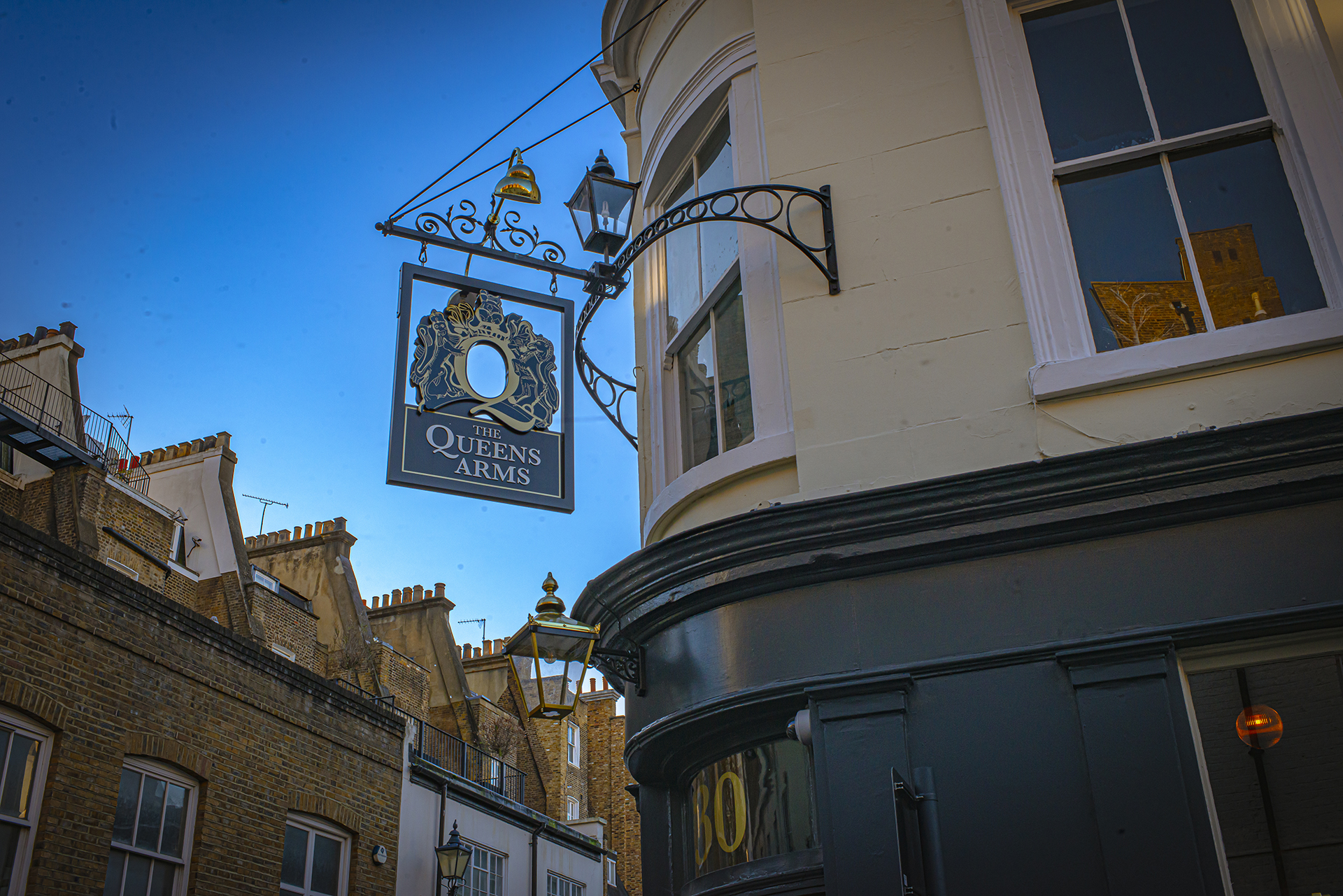 The Queen Arms Pub signage
